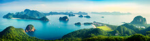 Panoramic Landscape Of Ocean, Mountains, And The Serene Islands Of Phuket, Thailand Under A Blue Sky