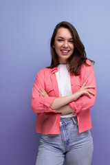 Canvas Print - confident brunette lady with dark hair below her shoulders in a shirt and jeans