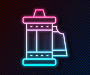 Wall Mural - Glowing neon line Camera vintage film roll cartridge icon isolated on black background. 35mm film canister. Filmstrip photographer equipment. Vector