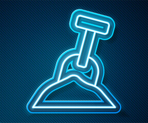 Wall Mural - Glowing neon line Sandbox with sand and shovel icon isolated on blue background. Vector