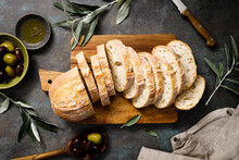 Ciabatta Bread Sliced On A Board, Top View