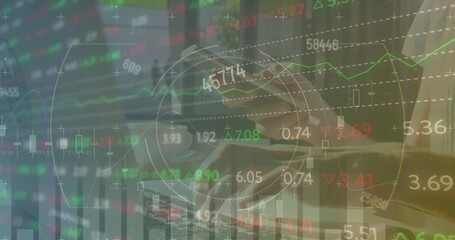 Poster - Animation of stock market data processing over mid section of a woman using smartphone and laptop