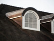 Dormer with white arched window