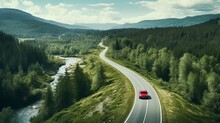 Generative AI. Concept Of Auto Travel During The Holiday Season. One Red Car Is Driving Along An Asphalt Mountain Road Along A Clear River And A Green Summer Forest. Aerial View. Road Trip Journey.