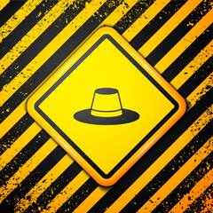 Wall Mural - Black Man hat with ribbon icon isolated on yellow background. Warning sign. Vector