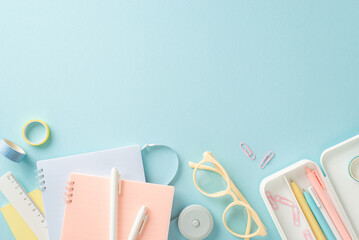 Canvas Print - Elevate your education with this top-down image of notepads, pens, paper clips, tape, ruler and glasses on pastel blue isolated background. Customize the empty place with text or ads