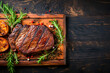 Grilled meat barbecue steak on a wooden board whit copy space. At the aged table. Top view. Digital art	