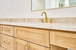 Bathroom vanity sink with wood cabinetry
