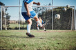 © Daniels C/peopleimages.com - Sports, training and football player score a goal for challenge at a game or match at tournament. Fitness, exercise and back of soccer athlete kicking a ball at practice on outdoor field at stadium.