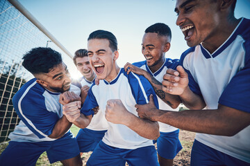 Winning, goal and soccer with team and achievement, men play game with sports and celebration on field. Energy, action and competition with male athlete group, cheers and happiness with success