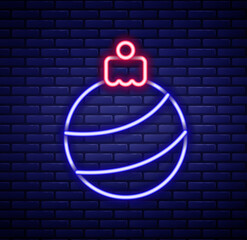 Sticker - Glowing neon line Christmas ball icon isolated on brick wall background. Merry Christmas and Happy New Year. Colorful outline concept. Vector