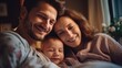 © visoot - Young couple relaxing at home with their baby, happy family, Father and mother their baby in bed.