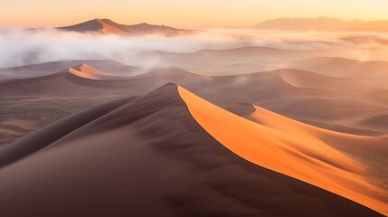 Wall Mural - Sunset in the desert - Drone shot of sand dunes covered in thick fog, sunrise at the Namib desert, in Namibia, Generative AI