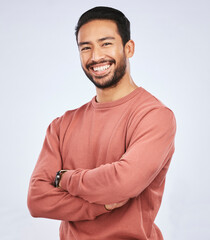 Wall Mural - portrait, smile and asian man with arms crossed, casual fashion and confident guy against a white st