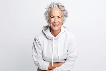 Canvas Print - smiling senior woman with grey hair looking at camera isolated on white