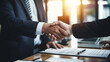 © Vittaya_25 - Partnership. two business people shaking hand after business job interview in meeting room office, negotiation, investor, success, partnership, teamwork, financial, connection concept, Generative AI
