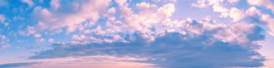 Wall Mural - Colorful cloudy sky at sunset. Gradient color. Sky texture. Abstract nature background. Horizontal banner