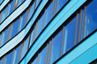 © photosis - Closeup of a facade of a blue modern office building in Arnhem in the Netherlands