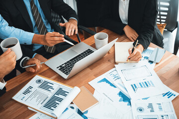 Poster - Diverse group of business analyst team analyzing financial data report paper on office table. Chart and graph dashboard by business intelligence analysis for strategic marketing planning Habiliment