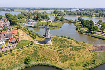 Wall Mural - Aerial from the traditional windmill Nooitgedagt in Woudrichem the Netherlands