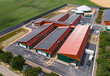 Drohnenfoto - Neubau eines Schweinestalles für mehr Tierwohl, mit einer Biogasanlage und PV - Anlagen auf den Dach.