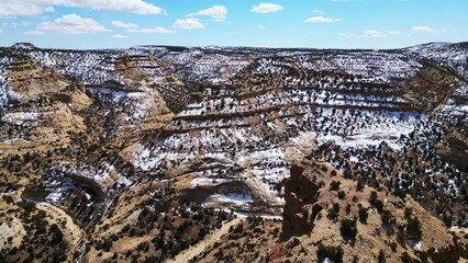 Wall Mural - A UAV Drone View of The Ivie Creek Gorge on I-70 in Winter looking at the erosion of the Sandstone Cliffs and the power of water.