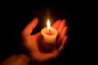 © top images - Burning candle in hands with selective focus. Concept symbol. AI generated, human enhanced