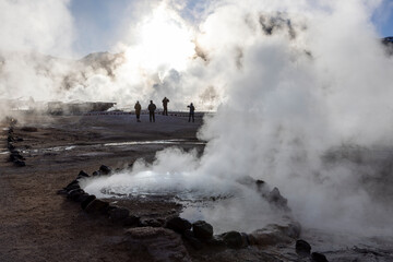  Exploring the fascinating geothermic fields of El Tatio with its steaming geysers and hot pools high up in the Atacama desert in Chile, South America