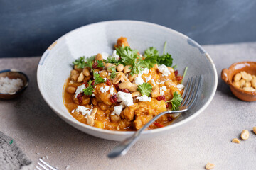 Poster - Chicken in curry sauce served in bowl