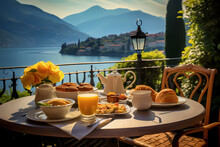 Beautiful Breakfast On Terrace Over Italian Lake On A Sunny Bright Day