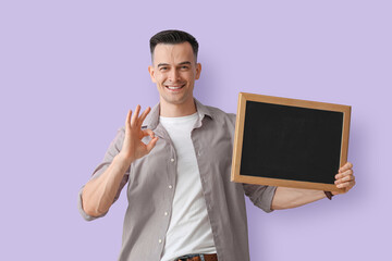 Poster - Male teacher with chalkboard showing OK on lilac background