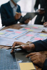 Wall Mural - business people discussing on performance revenue in meeting. businessman working with co-worker team. financial adviser analysing data with investor.