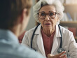 © Tessa - An elderly female doctor talking to a patient., Ai Generation