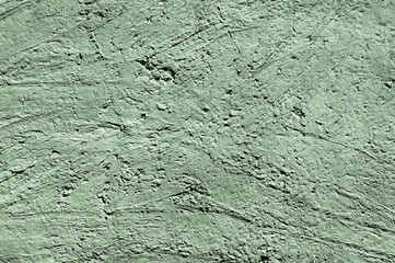 Wall Mural - Green stone texture close-up. Rough green stone wall. Natural rock texture