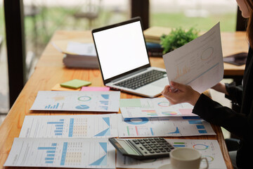 Wall Mural - Accountant woman working on laptop and do document, tax, exchange, research, accounting and Financial advisor concept