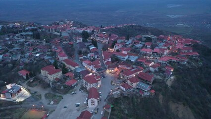 Wall Mural - View from drone of houses at Sighnaghi town at spring evening, eastern Georgia