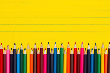 Poster - Color pencils crayons on vintage yellow ruled line notebook paper