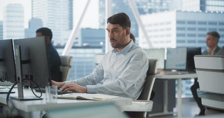 Poster - Happy Male Sales Manager Typing On Desktop Computer In Diverse Corporate Office With Megapolis Window View. Proffesional Caucasian Man Smiling After Closing Big Advertising Deal For E-commerce Company