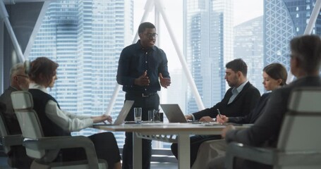 Poster - African American Male Entrepreneur Talks On Board Of Directors Meeting In Corporate Office. Diverse Investors Listening, Discussing With Confident Black Businessman Growth Strategy For Startup.
