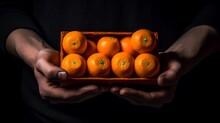 Tangerines In A Box In Hands. Generative AI