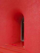 Black Door In The Red Wall