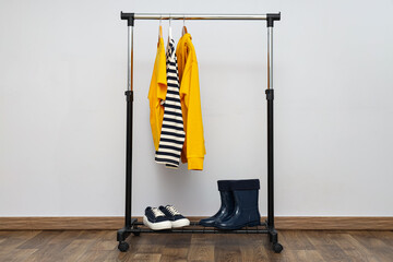 Wall Mural - Wardrobe rack with different clothes, concept of different clothes