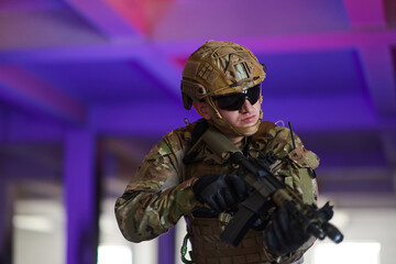 Wall Mural - A professional soldier undertakes a perilous mission in an abandoned building illuminated by neon blue and purple lights