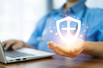 Doctor holding insurance icon for insurance concept, healthcare lift insurance or investment insurance.