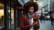 © Valeriia - Stylish black woman using her smartphone to stay connected in the bustling city, embracing the digital era. AI generated
