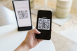 © Charlie's - Qr code payment. E wallet. Man scanning tag accepted generate digital pay without money.scanning QR code online shopping cashless payment and verification technology concept.