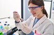 © Krakenimages.com - Young blonde woman scientist pouring blood on sample at laboratory