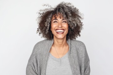 Portrait of beautiful young african american woman with curly hair smiling