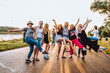 © larisikstefania - dancing cheerful attractive women at sunset.