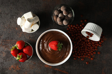 Wall Mural - Concept of tasty sweet food - chocolate fondue